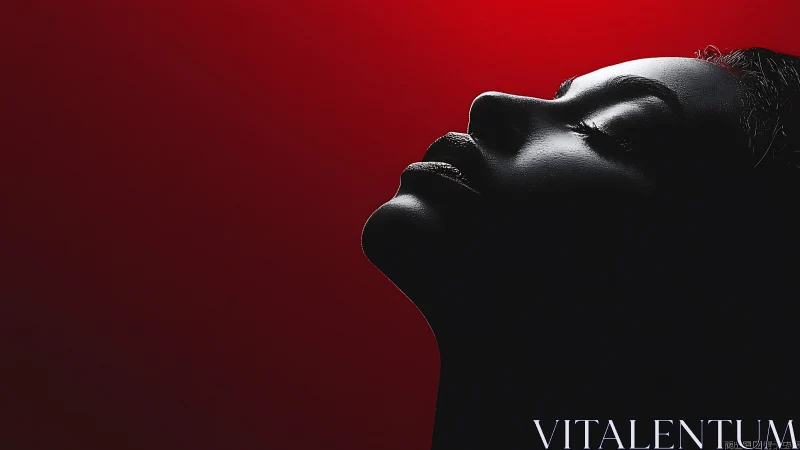 Silhouetted profile savors calm light against deep red glow