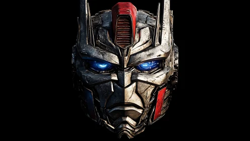 Metallic robotic face with illuminated blue mechanical eyes.