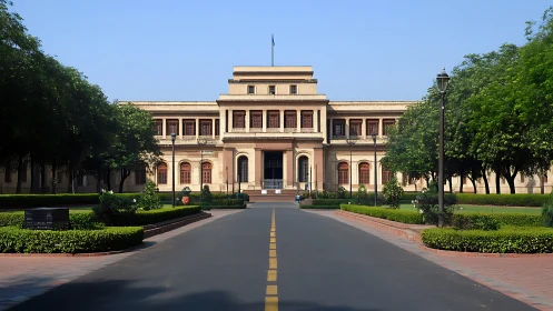 Symmetrical neoclassical academic building with central portico