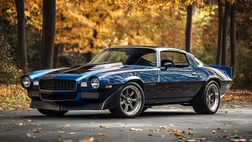 Midnight blue muscle legend idling beneath autumn golds.