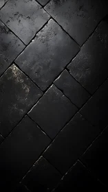 Dark stone tiles form dramatic diagonal geometric grid.