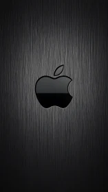 Apple Logo Shines Against Brushed Metal Texture