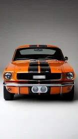 Bold orange muscle car stands poised with racing stripes.