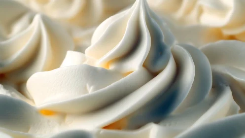 Cream swirls in macro close-up with soft diffused highlights.