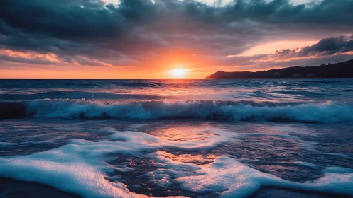 Sunset light ignites rolling waves along dramatic shoreline