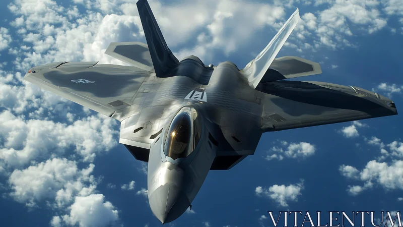 Stealth jet fighter over cloud layer is viewed from above