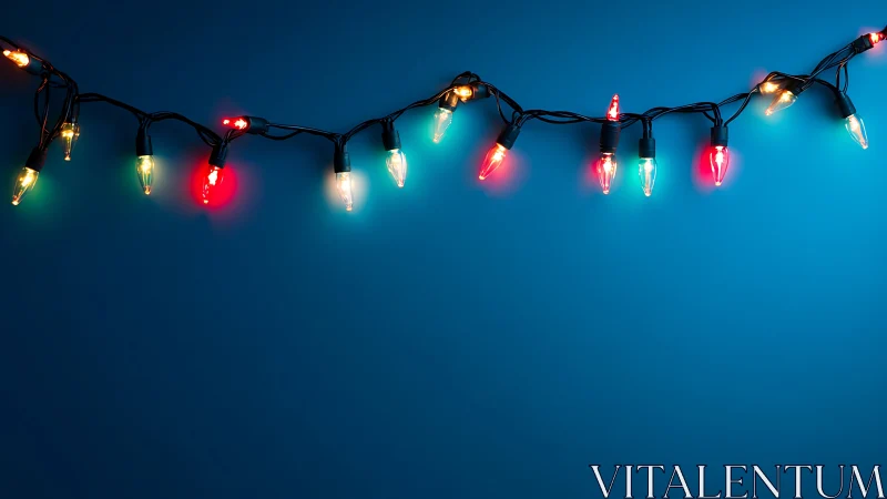 Colorful string lights glow warmly on a deep blue background
