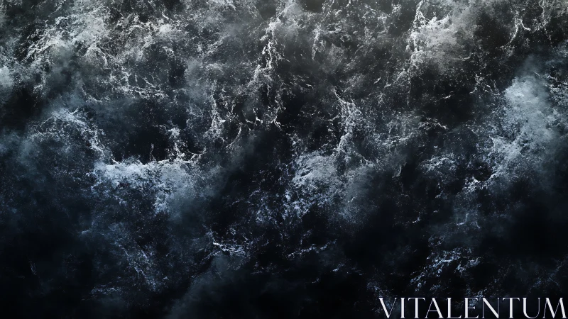 Storm-tossed dark ocean surface seethes under moody skies