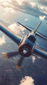 Single propeller aircraft over coastline at low altitude.
