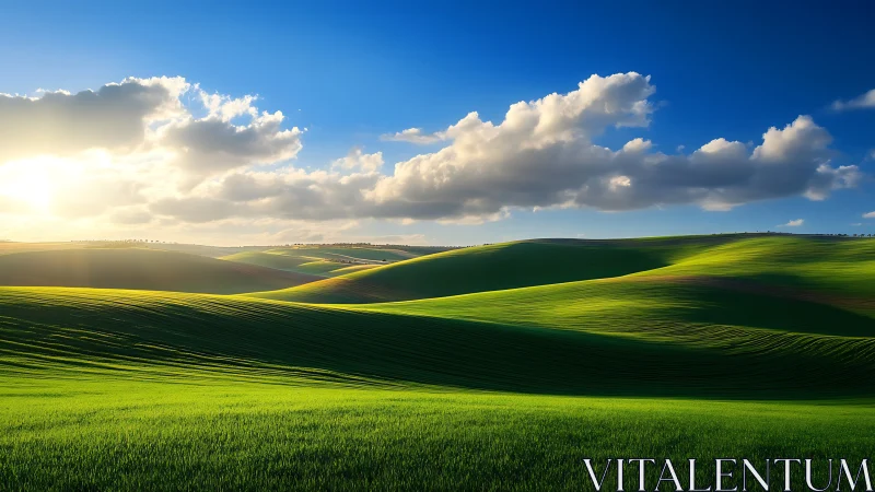 Sunlit emerald hills roll beneath a deep sapphire sky.