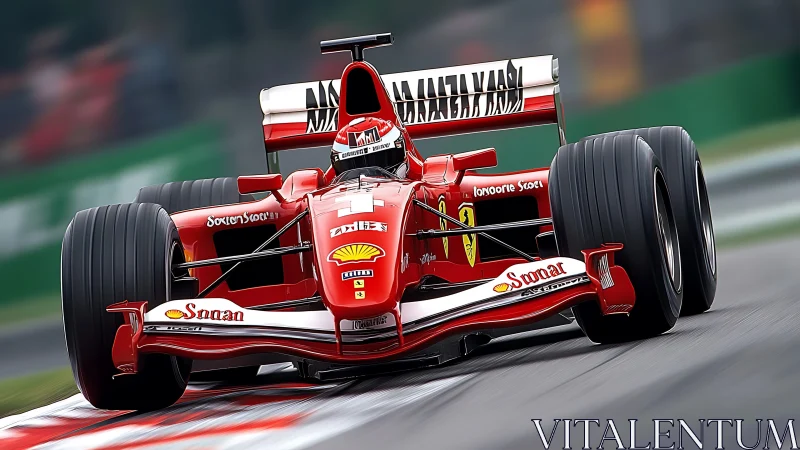 Red single-seater race car on track in front-facing view.