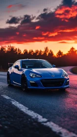 Sunset drive welcomes a sleek blue sports car to the road