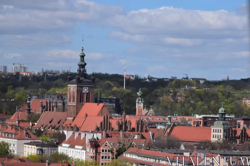 The Panoramic View Of The Sea of Red-Tiled Roofs in Poland's Historic City Free Stock Photo