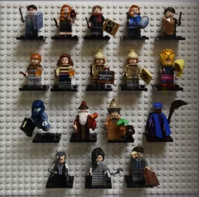 Wizarding Wonders: Lego Minifigurines of Iconic Harry Potter Characters on White Lego Wall