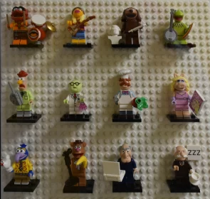 Muppet Magic: Lego Minifigurines of Beloved Characters Adorning a White Lego Wall