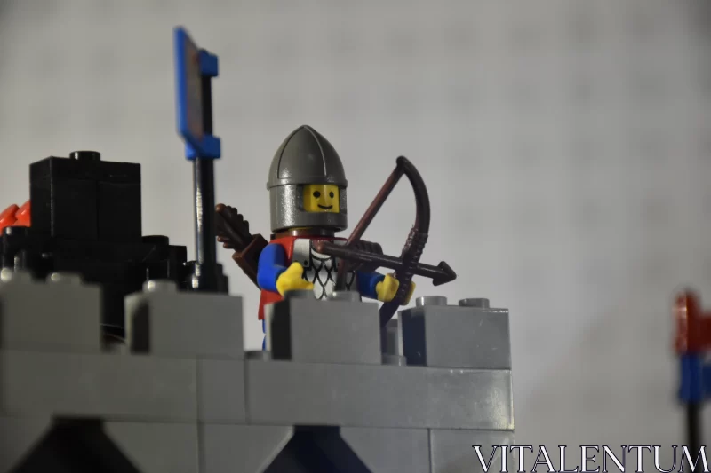 Lego Archer's Vigil: Close-Up of Sentinel on the Wall Free Stock Photo