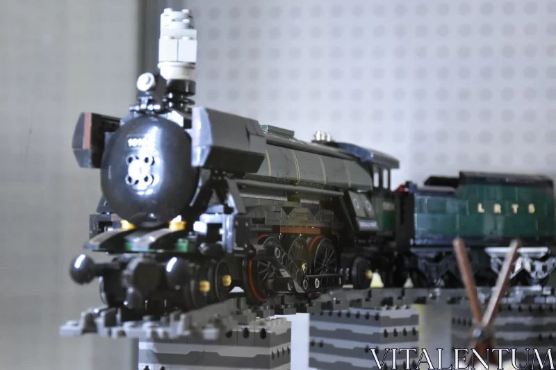 Emerald Express: Marvel at the Mesmerizing Metal Lego Train Free Stock Photo