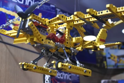 Lego Sky Soaring: Pilot in Yellow Hang Glider Takes Flight