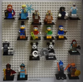 Disney Delights: Famous Characters in Lego Minifigurine Mosaic on White Wall