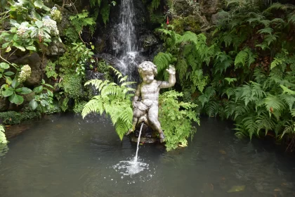 The Fountain That Looks Like A Boy Sitting On A Vase Free Stock Photo
