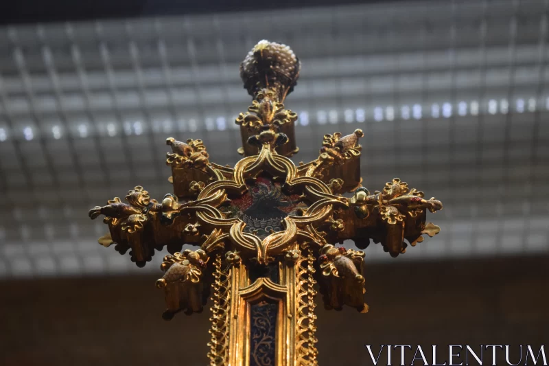 Golden Cross with Ornate Decoration: A Dark Foreboding Close-up Free Stock Photo
