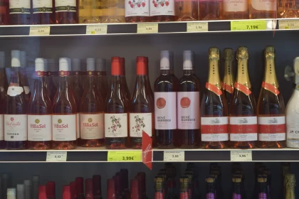 Rosé Wine Bottles on Deli Shelf - A Chinese Tradition Inspired Scene