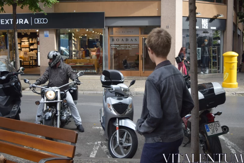 Normcore Street Scene with Boy on Motorbike Free Stock Photo
