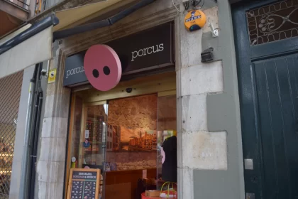 Quaint Shop with a Pink Sign in Sabadell - A Playful Urban Aesthetic