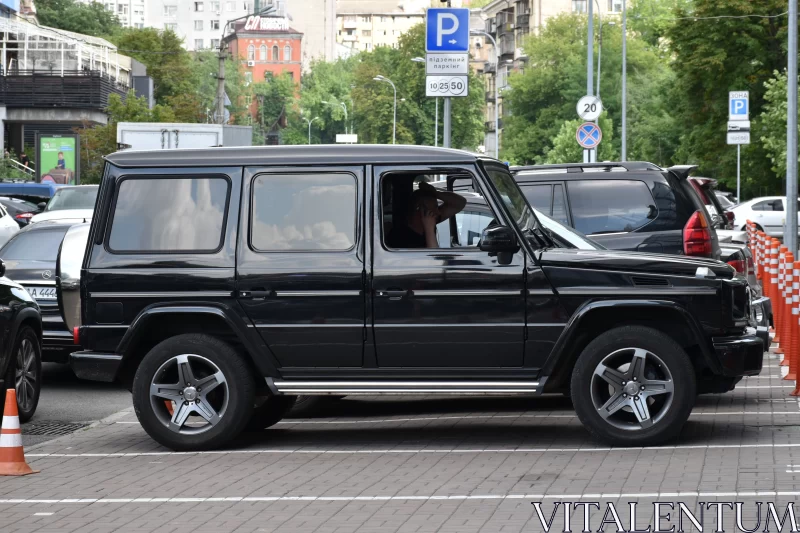 MercedesBenz g650 Parked at Airport - Noir Aesthetic Free Stock Photo