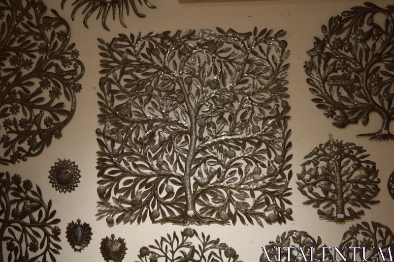 Intricate Botanical Metal Wall Art in Silver and Beige Free Stock Photo