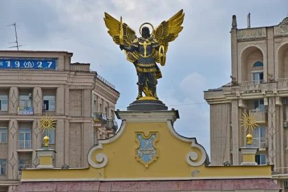 Navy and Gold Angel Monument in the City