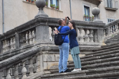 Capturing Moments: A Man and Woman on Steep Steps