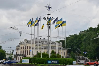 Ukrainian Capital Kyiv: Sunny Day with Flags on the Street