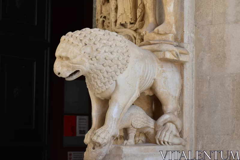 Stone Lion and Vulture Sculpture in Ivory Free Stock Photo