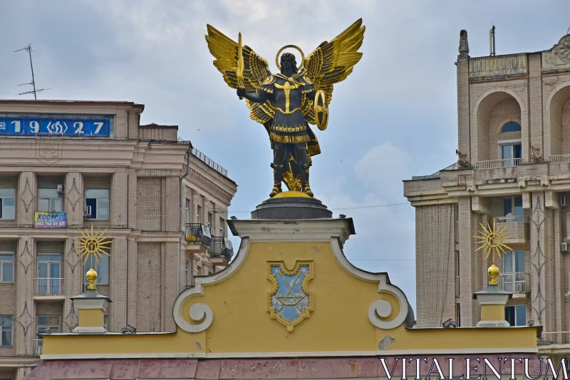 Navy and Gold Angel Monument in the City Free Stock Photo