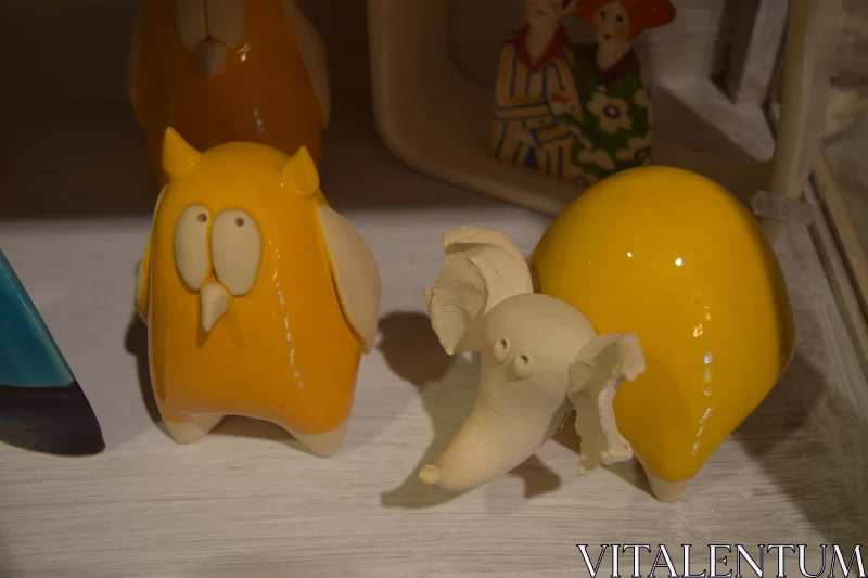 Whimsical Ceramic Animal Figurines in Cartoon Style Free Stock Photo