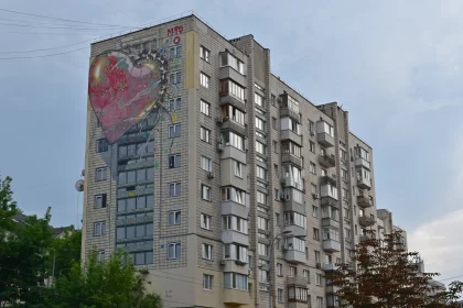 Urban Love: Graffiti Hearts on Apartment Building