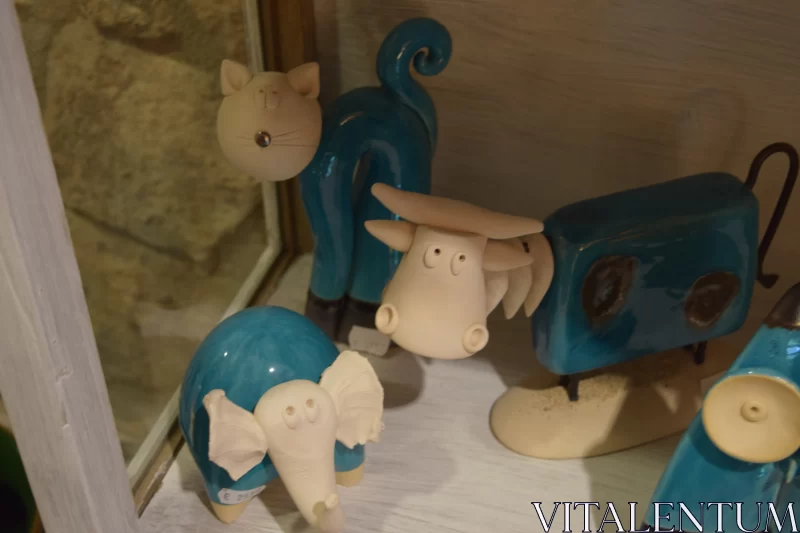 Ceramic Animal Figurines on Shelf - Rural Life Art Free Stock Photo