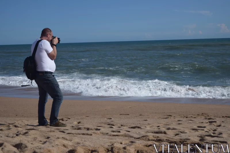 Man Contemplating Waves on Beach - Nikon D750 Photography Free Stock Photo