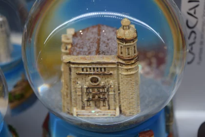 Mixed Media Snow Globe with Miniature Religious Building Free Stock Photo