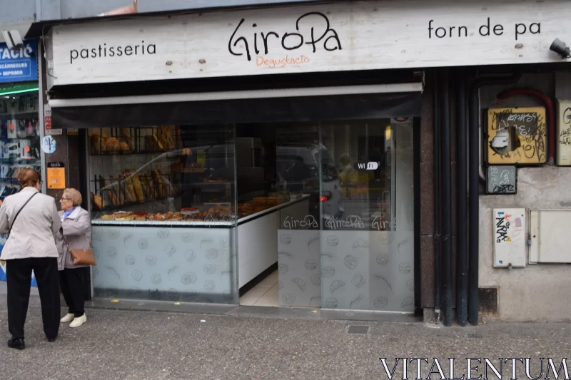 Glasgow's Grit: A Bakery's Glass Door Free Stock Photo