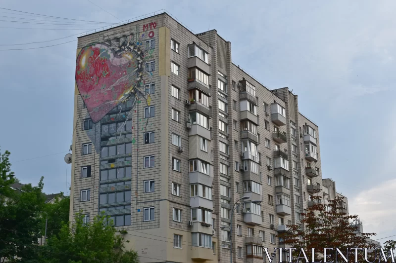 Urban Love: Graffiti Hearts on Apartment Building Free Stock Photo