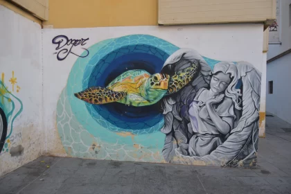 Captivating Street Art: Turtles and Man in Blue