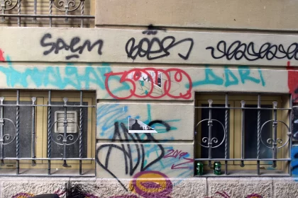 Urban Graffiti: A Colorful Symphony on Building Walls Free Stock Photo