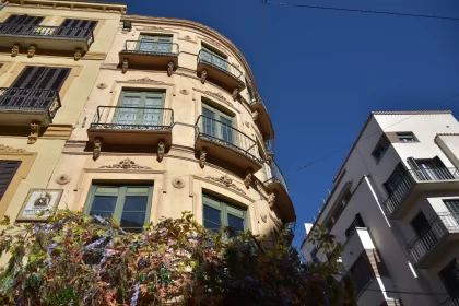 Art Nouveau Tenement Building Amidst Mediterranean Landscape