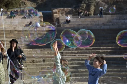 Children's Joyful Play with Soap Bubbles