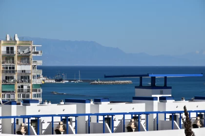 Mediterranean Coastal Cityscape with Harbor Views