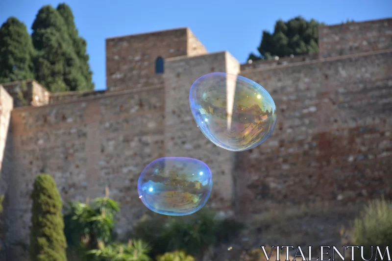 Luminous Soap Bubbles Against Historic Castle Free Stock Photo