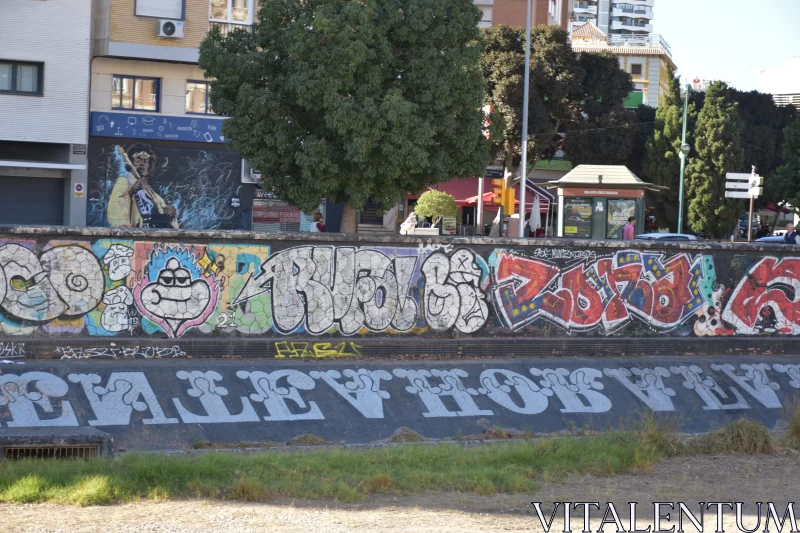 Urban Life: Street Art Graffiti on Fence Free Stock Photo