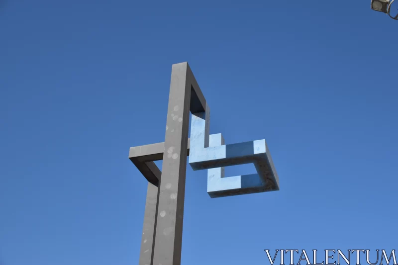Square Clock Sculpture: An Intersection of Art and Faith Free Stock Photo